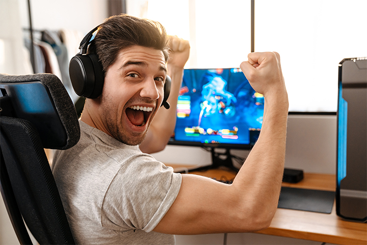Ecstatic man scoring big on PC game